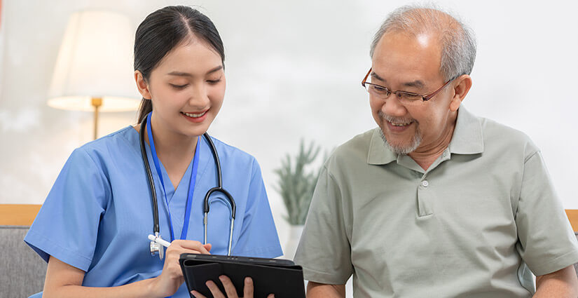 Nurse Navigator going over resources with oncology patient.